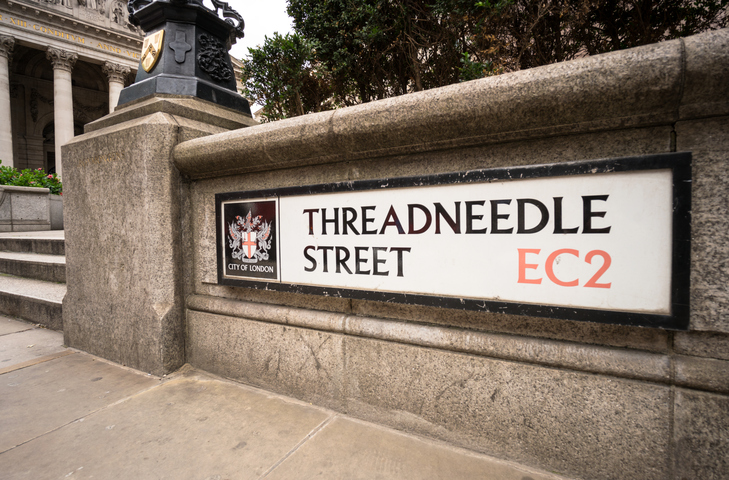 London, UK - A sign for Threadneedle Street, the location of the UK's Central Bank, the Bank of England, in London's traditional financial centre, the City of London.