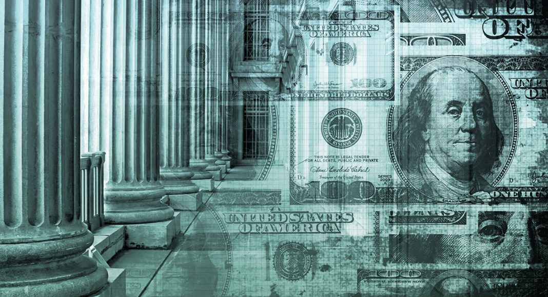 banking system-blue images of money overlayed on image of federal building entrance with big columns