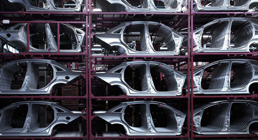 Car shells stocked inside a car plant