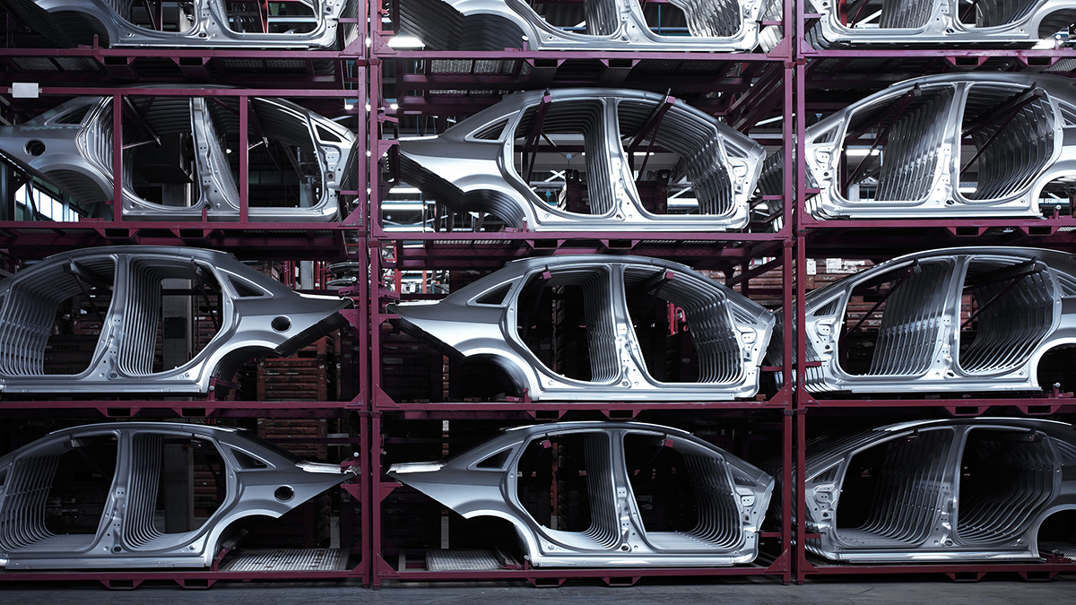 Car shells stocked inside a car plant