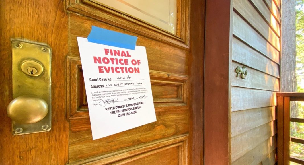 An eviction notice taped to a door