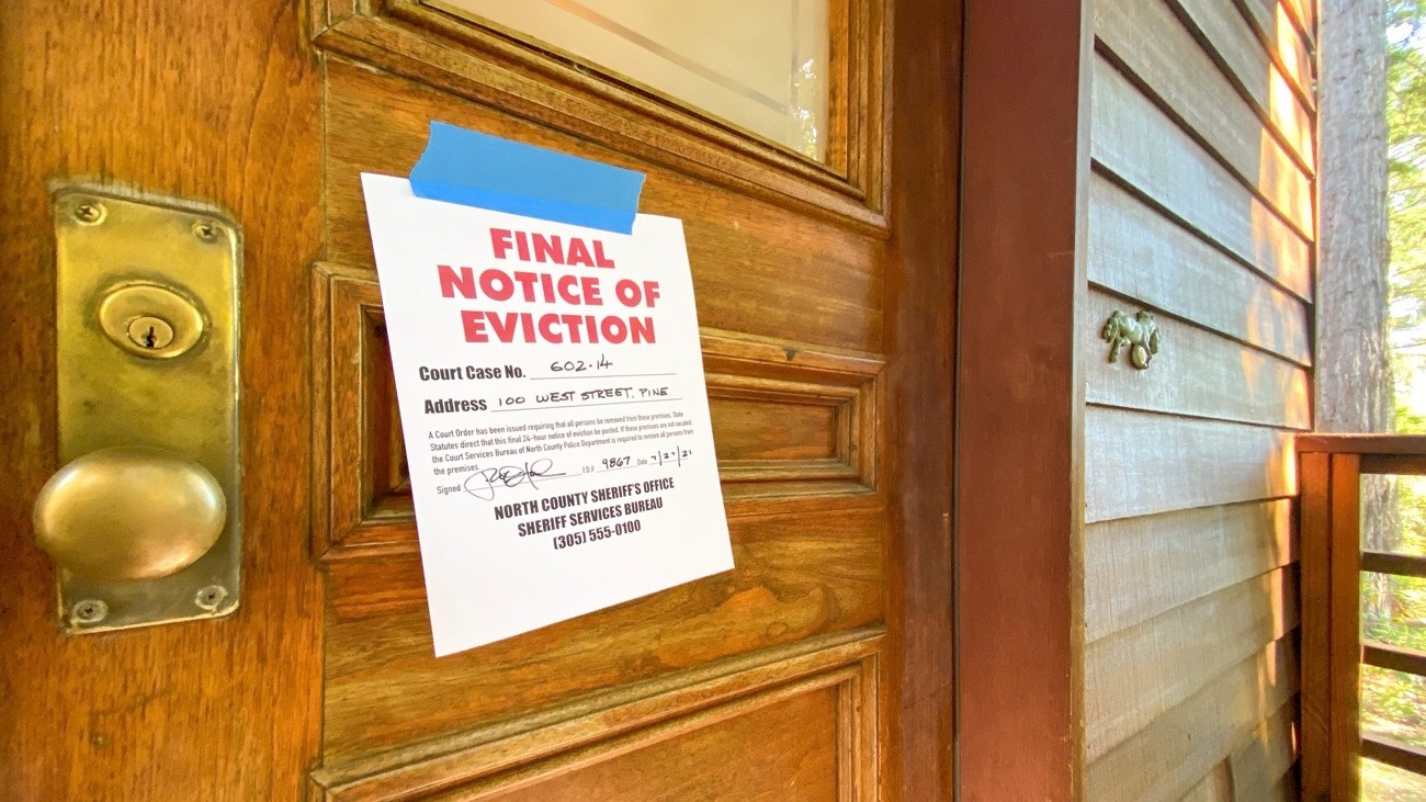 An eviction notice taped to a door
