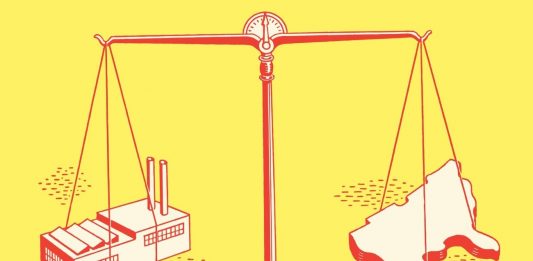 Scales on yellow background, on one side a factory and on the other a map of the US
