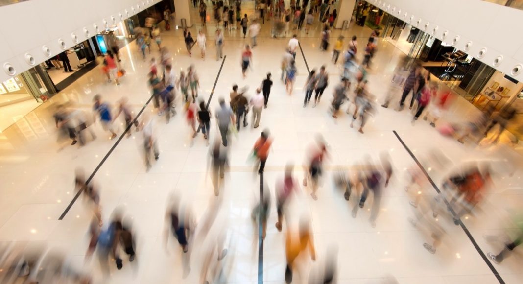 People walking in mall shopping